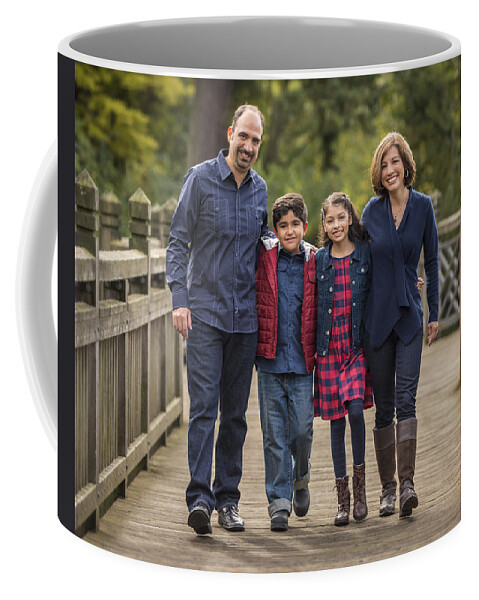 Andy And Cristi Rivas Coffee Mug featuring the photograph Bridge Walk - Group Hug by Lori Grimmett
