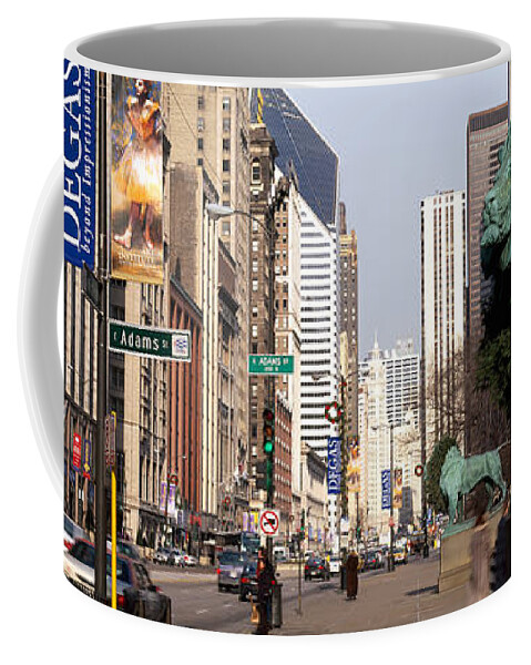 Photography Coffee Mug featuring the photograph Bronze Lion Statue In Front by Panoramic Images