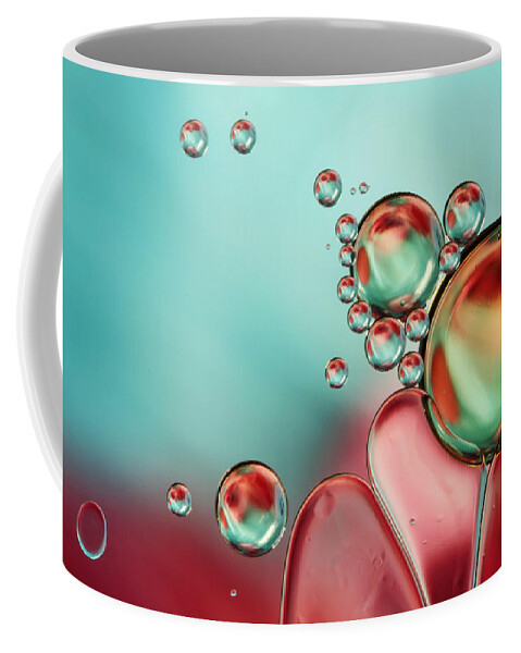 Oil Coffee Mug featuring the photograph Bubble Balance by Sharon Johnstone