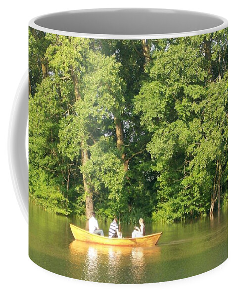  Coffee Mug featuring the photograph Canoe for three by Nora Boghossian