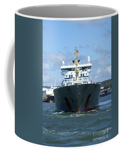Afloat Coffee Mug featuring the photograph Cargo Ship by Antony McAulay