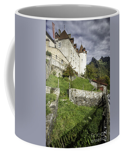 Leysin Coffee Mug featuring the photograph Chateau de Gruyeres by Timothy Hacker