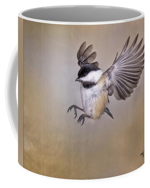 Chickadee In Flight Coffee Mug featuring the photograph Cheery Chickadee by Peg Runyan