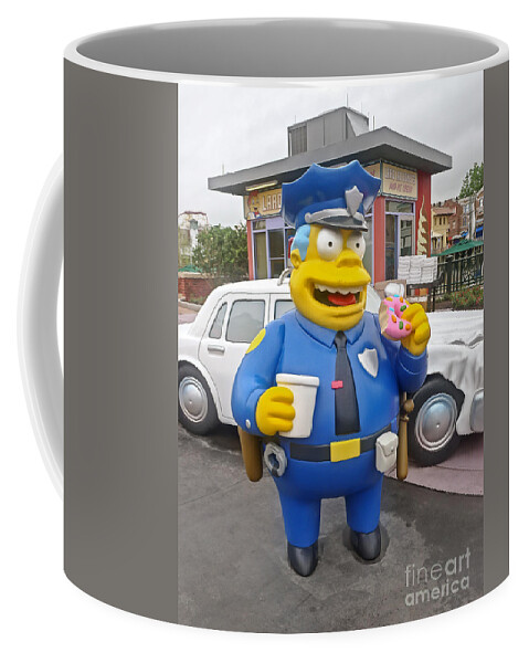 Florida Coffee Mug featuring the photograph Chief Clancy Wiggum from The Simpsons by Edward Fielding