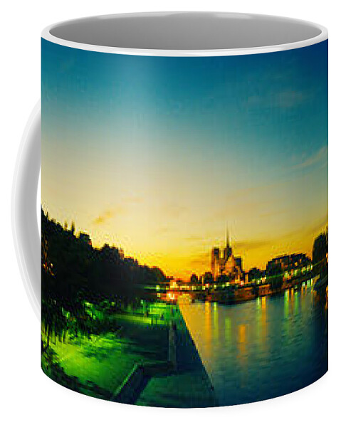 Photography Coffee Mug featuring the photograph City Lit Up At Dusk, Notre Dame, Paris by Panoramic Images
