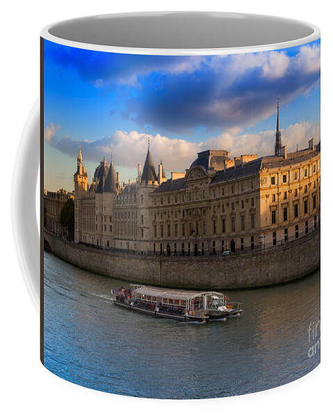 Conciergerie Coffee Mug featuring the photograph Conciergerie and the Seine River Paris by Louise Heusinkveld