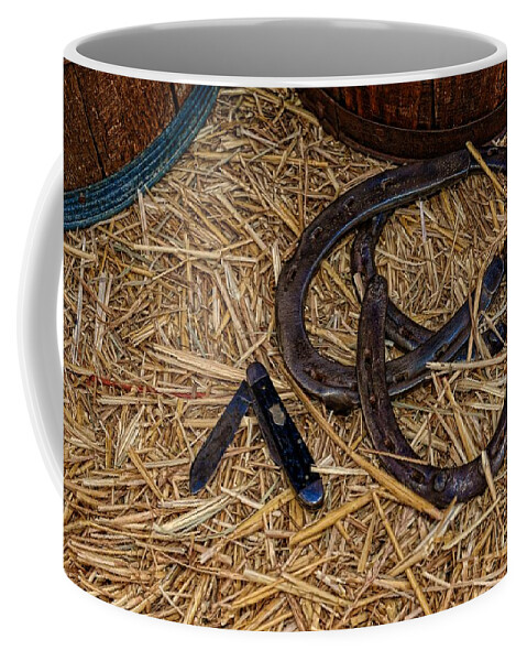 Barn Coffee Mug featuring the photograph Cowboy theme - horseshoes and whittling knife by Paul Ward