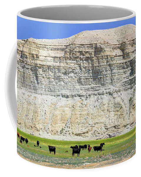 Cows Coffee Mug featuring the photograph Grazing Cows Green River Cliffs Thunderstorm by Gary Whitton