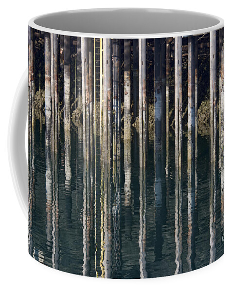 Dock Pilings Coffee Mug featuring the photograph Dock Pilings by David Arment