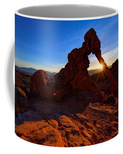 Elephant Arch Coffee Mug featuring the photograph Elephant Sunrise by Chad Dutson