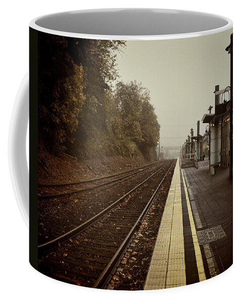 Railroad Coffee Mug featuring the photograph Empty station by Ron Roberts