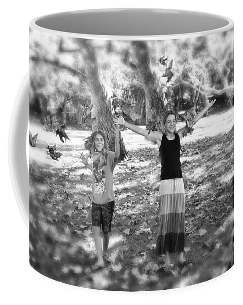 Falling Coffee Mug featuring the photograph Falling Leaves by Diana Haronis