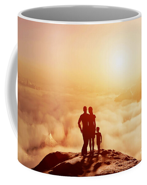 Family Coffee Mug featuring the photograph Family together on mountain looking on sunset by Michal Bednarek