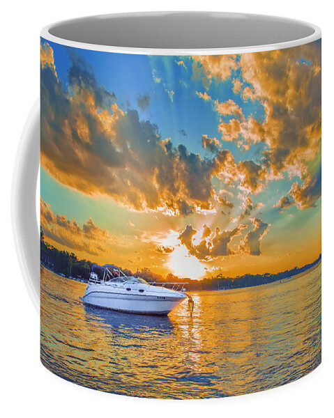 Sunset Coffee Mug featuring the photograph Fiery Sunset On Lake Minnetonka by Bill and Linda Tiepelman