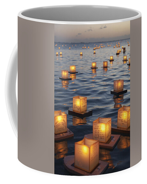 Ala Moana Coffee Mug featuring the photograph Floating Lanterns at Sunset by Brandon Tabiolo