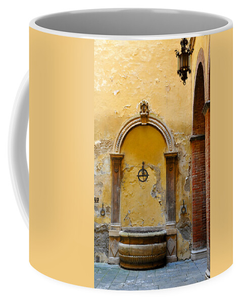 Sienna Ochre Fountain Italy Coffee Mug featuring the photograph Fountain in Sienna by Susie Rieple