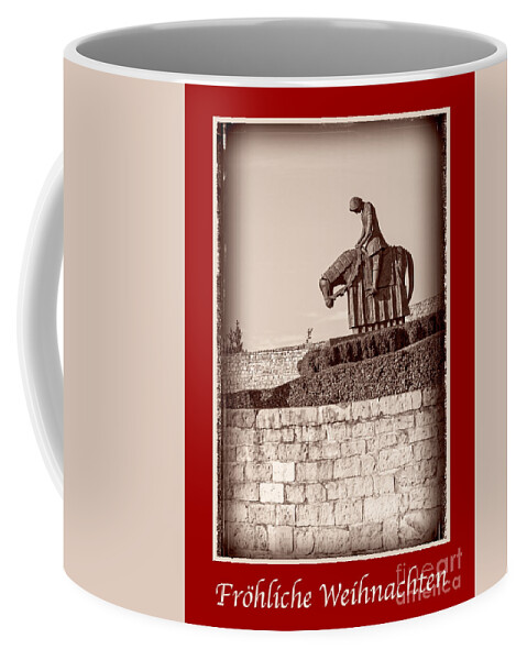 German Coffee Mug featuring the photograph Frohliche Weihnachten with St Francis by Prints of Italy