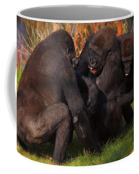 Monkey Coffee Mug featuring the photograph Gorillas having fun together by Nick Biemans