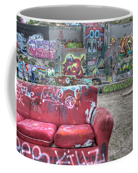 Grafitti Coffee Mug featuring the photograph Grafitti Couch by Jane Linders