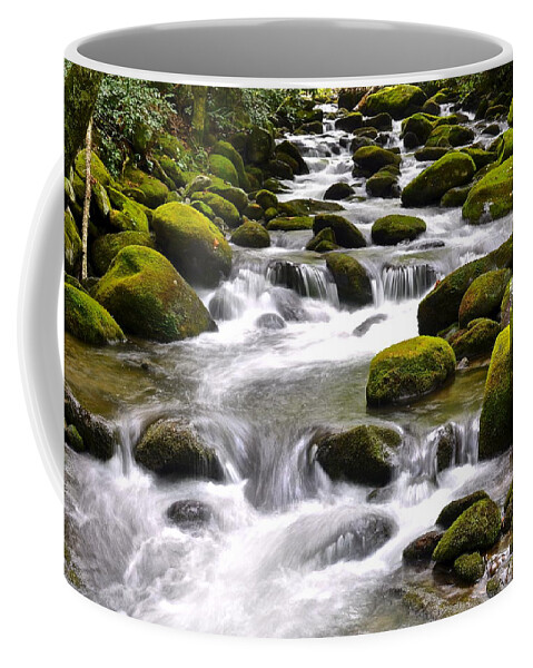 Green Coffee Mug featuring the photograph Green Flowing Stream by Frozen in Time Fine Art Photography