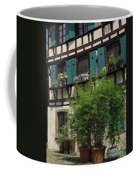 Timber Coffee Mug featuring the photograph Half-Timbered House in Strasbourg by Amanda Mohler
