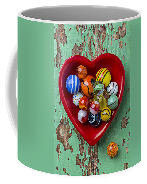 Heart Coffee Mug featuring the photograph Heart Dish With Marbles by Garry Gay