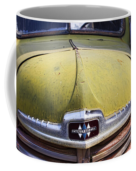 Car Coffee Mug featuring the photograph Hood of an old International by Cathy Anderson