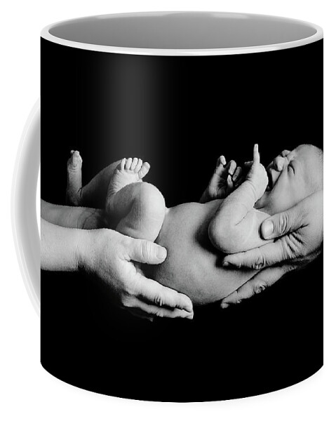Newborn Coffee Mug featuring the photograph In Your Hands by Sebastian Musial