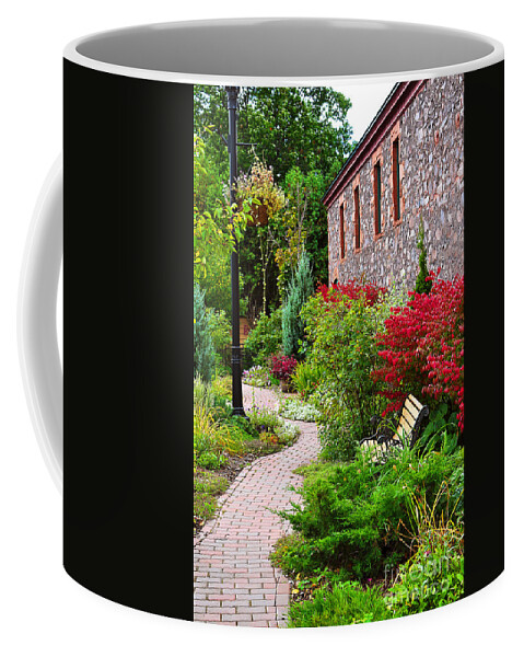 Garden Landscape Coffee Mug featuring the photograph Inner City Beauty by Gwen Gibson