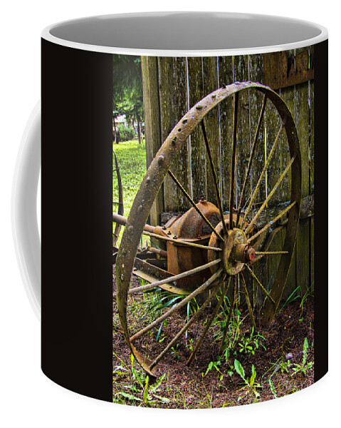 Iron Coffee Mug featuring the photograph Iron Wheel by Ron Roberts