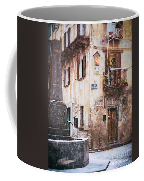 Architecture Coffee Mug featuring the photograph Italian square in snow by Silvia Ganora