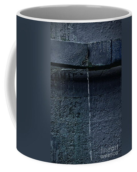 Wall Coffee Mug featuring the photograph Leak by Margie Hurwich