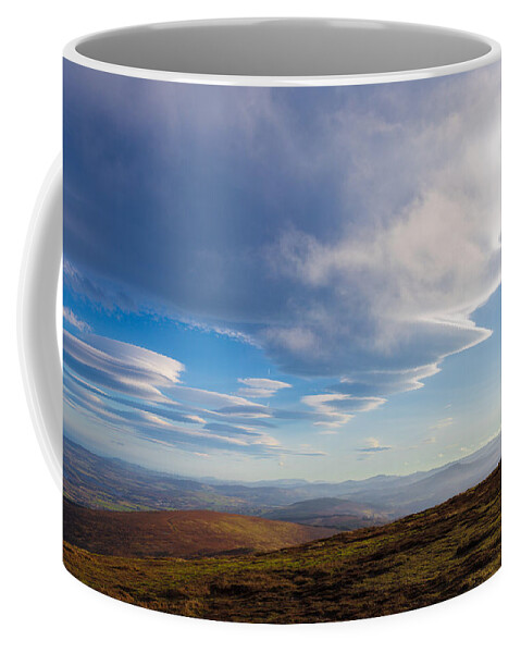 Blue Coffee Mug featuring the photograph Lenticular clouds forming in Wicklow Mountains by Semmick Photo