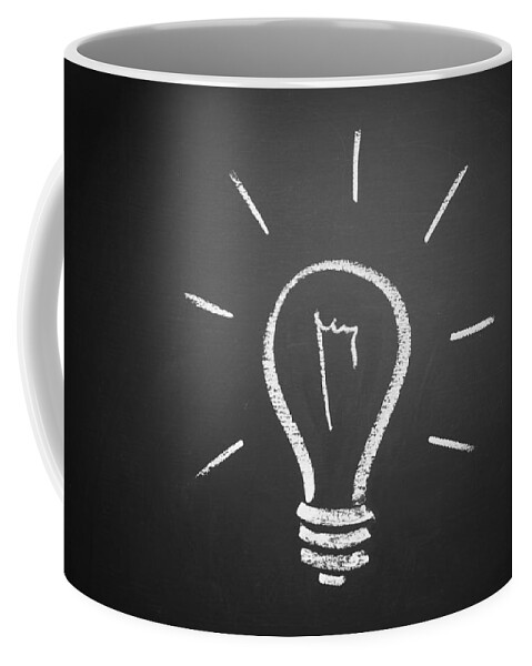 Light Bulb Coffee Mug featuring the photograph Light Bulb on a Chalkboard by Chevy Fleet