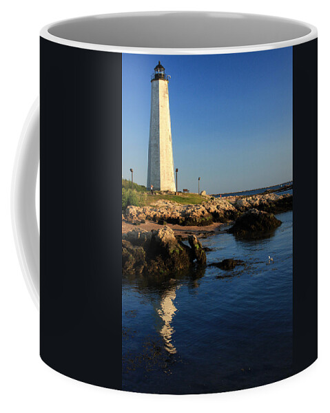 Lighthouse Coffee Mug featuring the photograph Lighthouse Reflected by Karol Livote