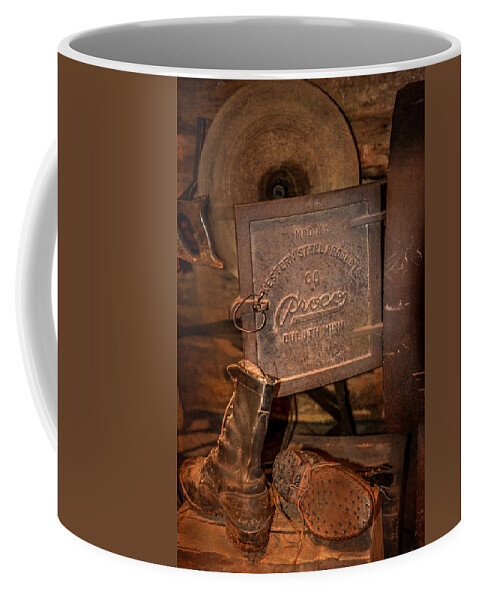Boots Coffee Mug featuring the photograph Logging Boots by Paul Freidlund