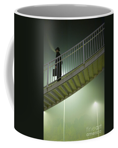 Man Coffee Mug featuring the photograph Man With Case On Steps Nighttime by Lee Avison