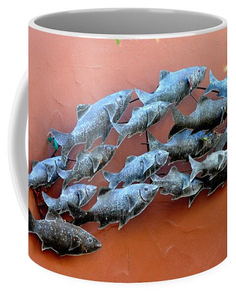Animal Coffee Mug featuring the photograph Metal Fish Sculpture On Terra Cotta Garden Wall by Jay Milo