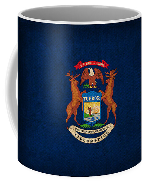 Michigan State Flag Art On Worn Canvas Coffee Mug featuring the mixed media Michigan State Flag Art on Worn Canvas by Design Turnpike