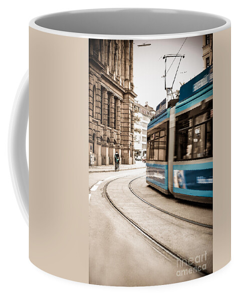 Ancient Coffee Mug featuring the photograph Munich city traffic by Hannes Cmarits