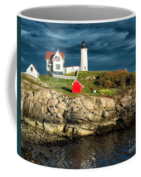 Maine Coffee Mug featuring the photograph Nubble lighthouse by Izet Kapetanovic