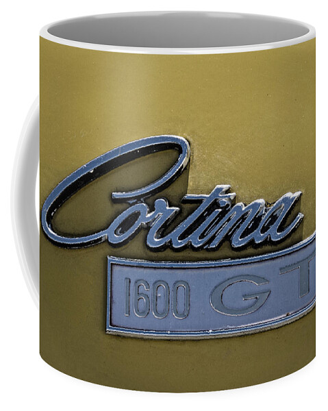 American Coffee Mug featuring the photograph Old Ford Cortina Symbol by Paulo Goncalves