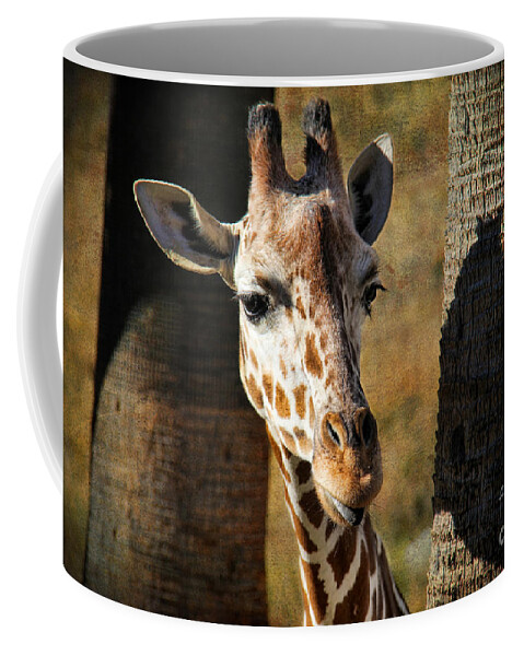 Peekaboo Giraffe Coffee Mug featuring the photograph Peekaboo Giraffe by Mariola Bitner