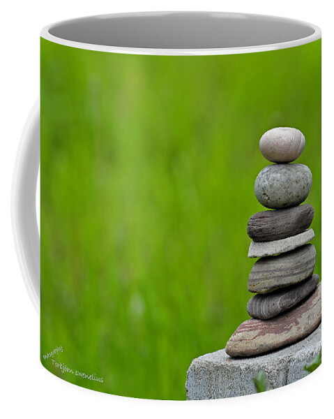 Piled Stones Coffee Mug featuring the photograph Piled Stones by Torbjorn Swenelius