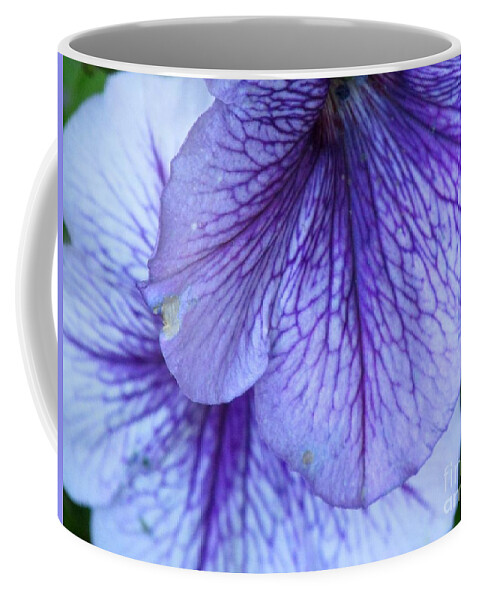 Petunias Coffee Mug featuring the photograph Purple Petunias by Lynellen Nielsen