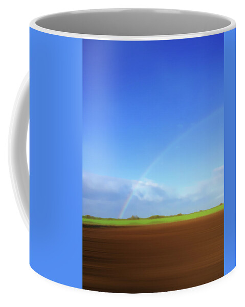 Beauty In Nature Coffee Mug featuring the photograph Rainbow In Field by Ikon Ikon Images