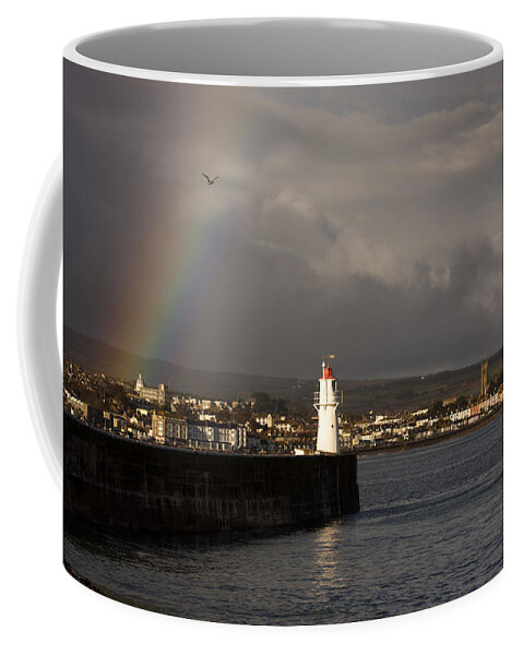 Rainbow Coffee Mug featuring the photograph Rainbow over Newlyn Harbour Lighthouse by Tony Mills