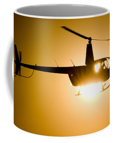 Robinson R44 Raven Ii Coffee Mug featuring the photograph Raven Sun by Paul Job