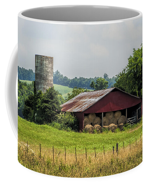 Barn Coffee Mug featuring the photograph Red Barn and Bales of Hay by Kathy Clark