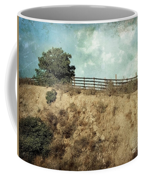 Landscapes Coffee Mug featuring the photograph Rising Above by Ellen Cotton